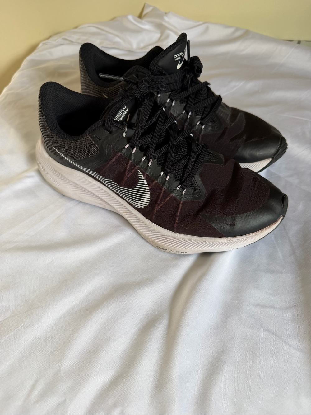 Nike Women’s Black and White Zoom Running Shoes